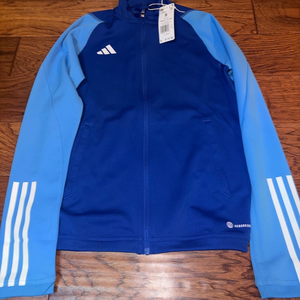 Adidas warm-up jacket Adult Small but fits older kid XL